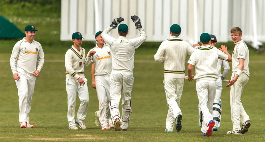 cricket-team-celebrating